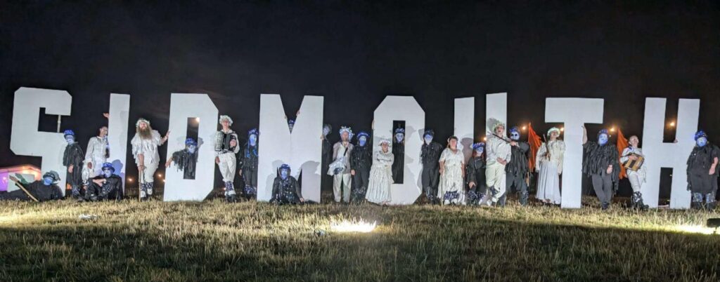 Boggarts in Light and Dark kit (for the LNE) standing around large letters spelling out 'Sidmouth'