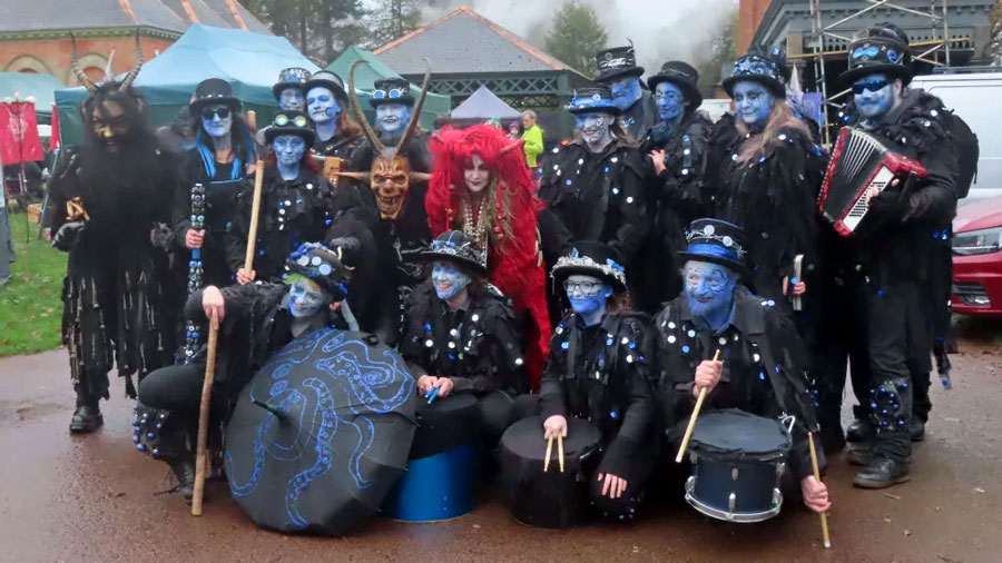 Boggarts posing for a photo with members of Krampus